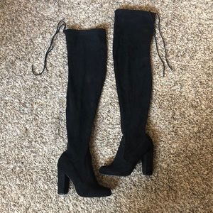 Size 7 black thigh high boot